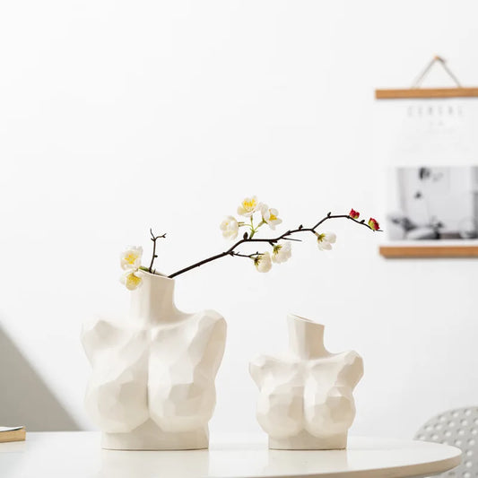 Elevate your decor with our Nordic Geometric White Art Female Bust Vase – a captivating fusion of modern design and artistic elegance.